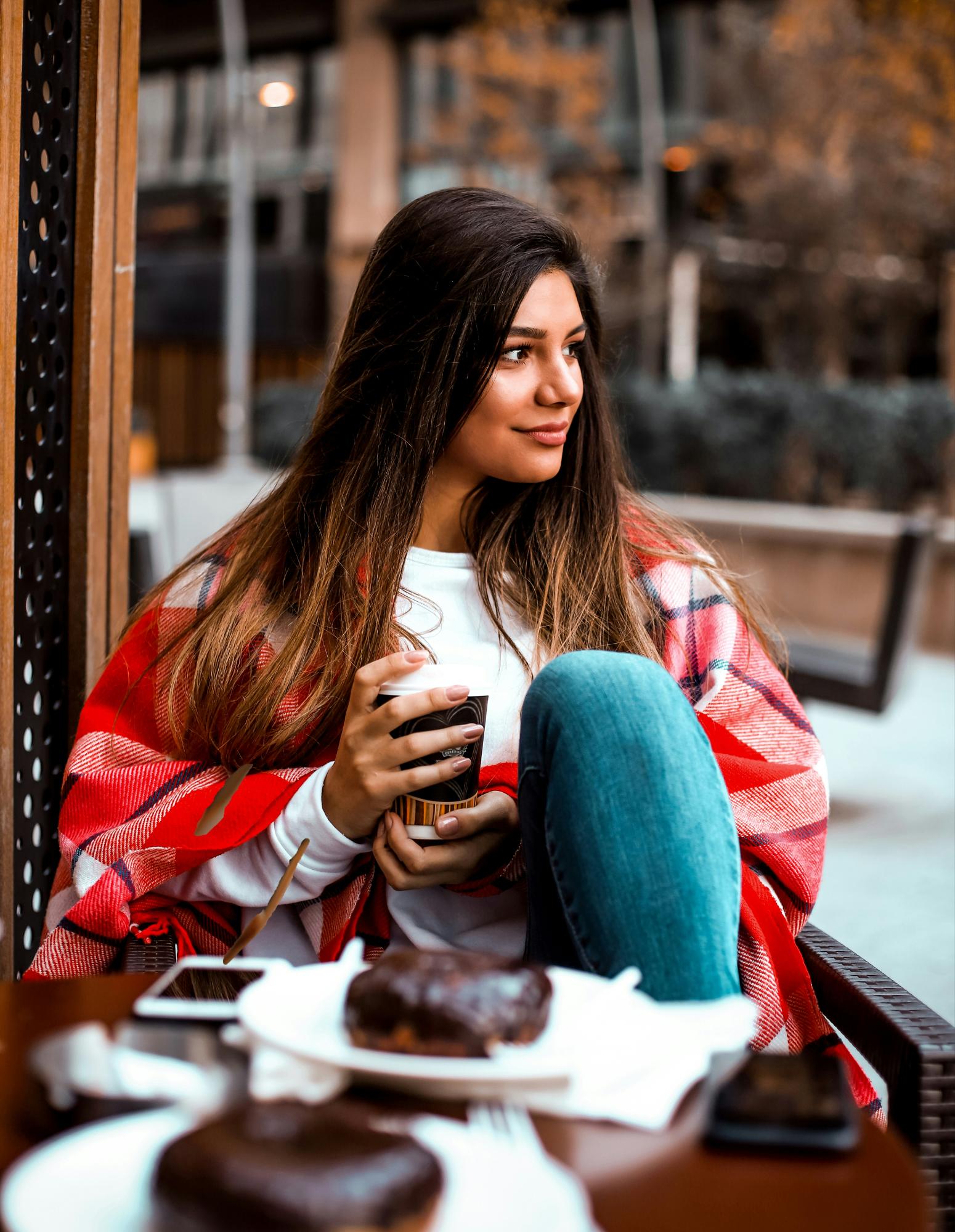 Disordered eating support - woman thinking about food with doughnuts